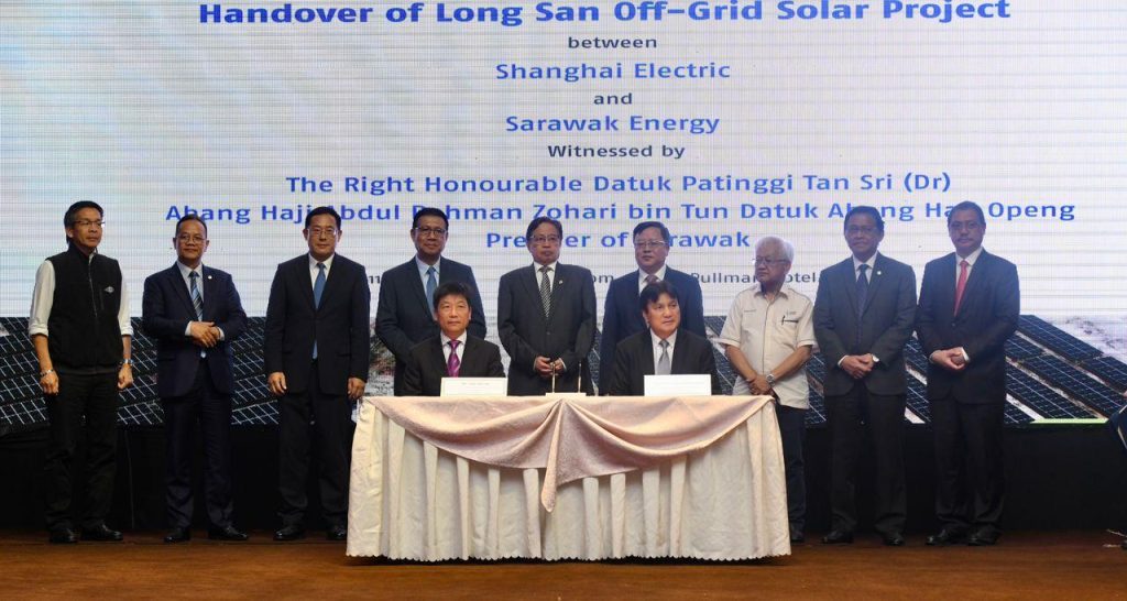 The signing and exchanging of the Long San Solar Hybrid Station handover certificate between Vice President for Shanghai Electric Power Transmission & Distribution Group, Yang Xing Hai, who is also the Chairman of Shanghai Electric for Malaysia and Sarawak Energy, represented by its Group Chief Executive Officer, Datu Haji Sharbini Suhaili. The signing and exchange were witnessed by the Premier of Sarawak, The Right Honourable Datuk Patinggi Tan Sri (Dr) Abang Haji Abdul Rahman Zohari bin Tun Datuk Abang Haji Openg, formalising the handover of the project
